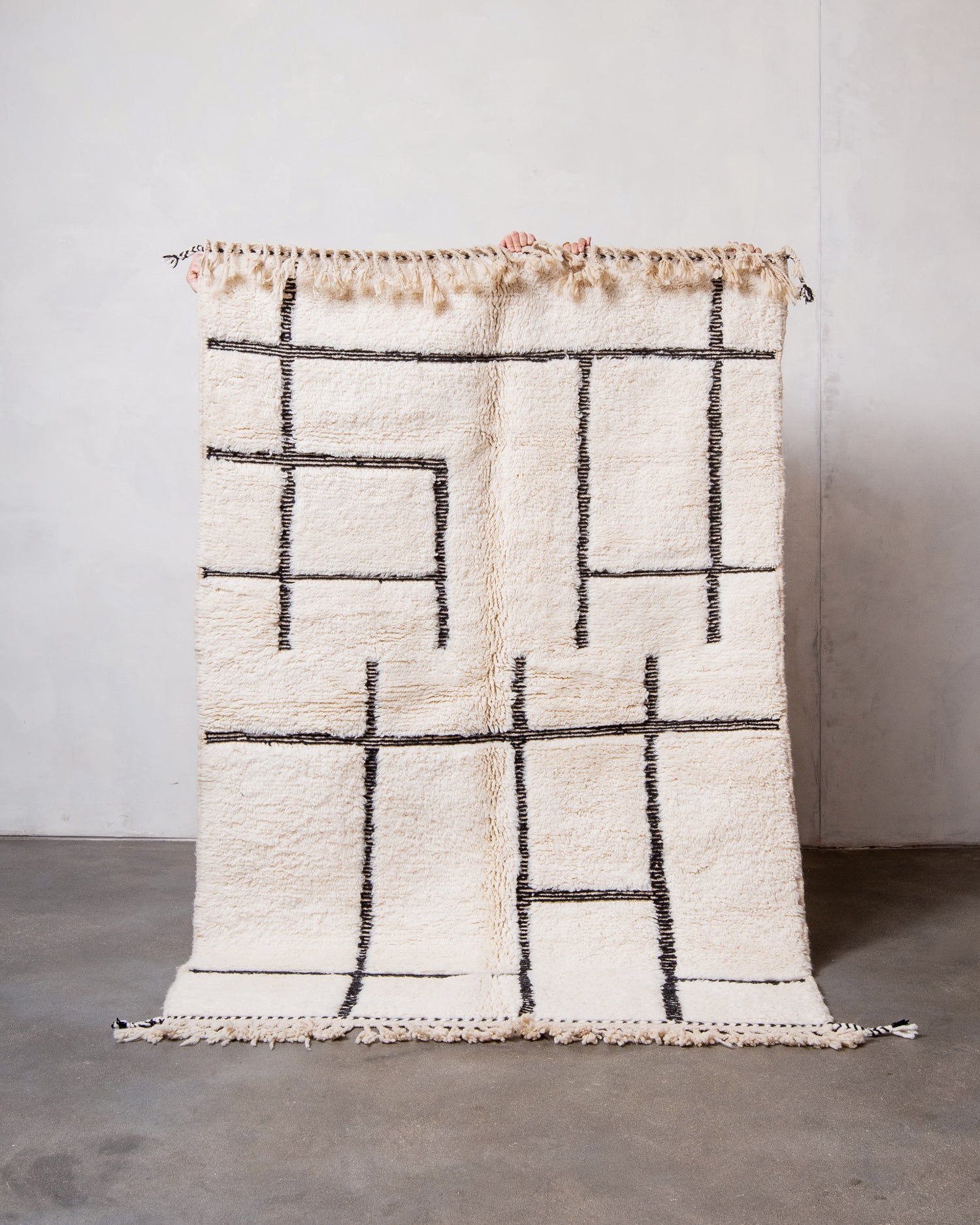 Modern, designer, handcrafted Berber rug from Morocco. Beniourain carpet with beautiful colours and patterns and fluffy wool texture.